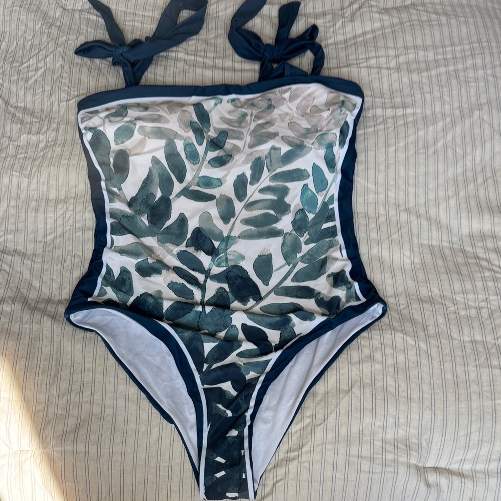 Leaf Print One-Piece Swimsuit with sarong (covered) New with protection sticker.